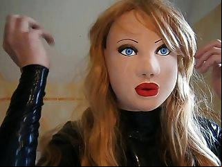 masked latex doll with blond wig tmb